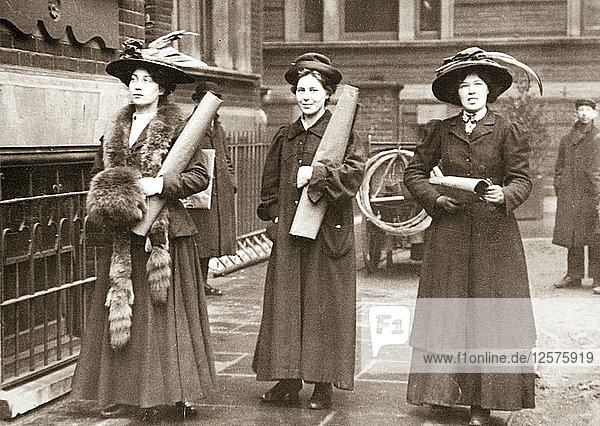 Suffragettes armed with materials to chain themselves to railings  1909. Artist: Unknown