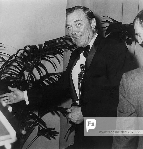 American Actor And Film Star Ben Johnson With An Oscar 1972 Artist Unknown