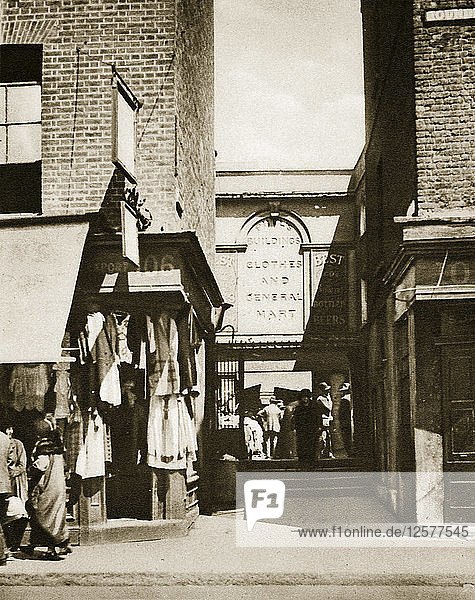 Houndsditch clothing market  London  20th century. Artist: Unknown