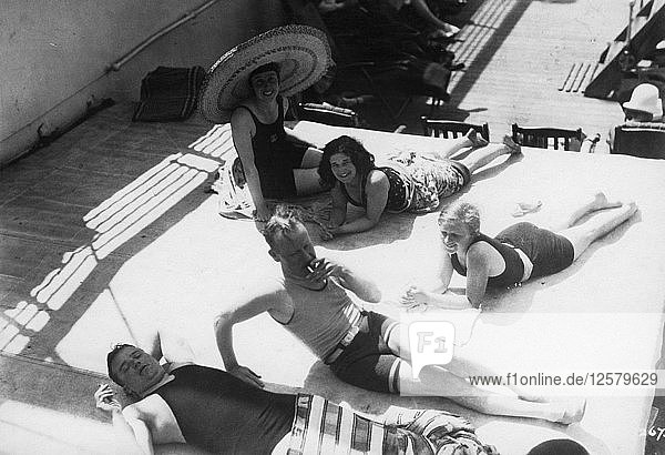 Passengers sunbathing on board a cruise ship  c1920s-c1930s(?). Artist: Unknown