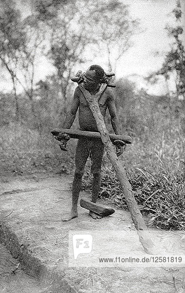 Niam Niam lunatic  Mongalla to Terrakekka  Sudan  1925 (1927). Artist: Thomas A Glover