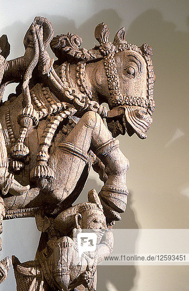 Wood carving of warrior prince on horseback part of a processional chariot.