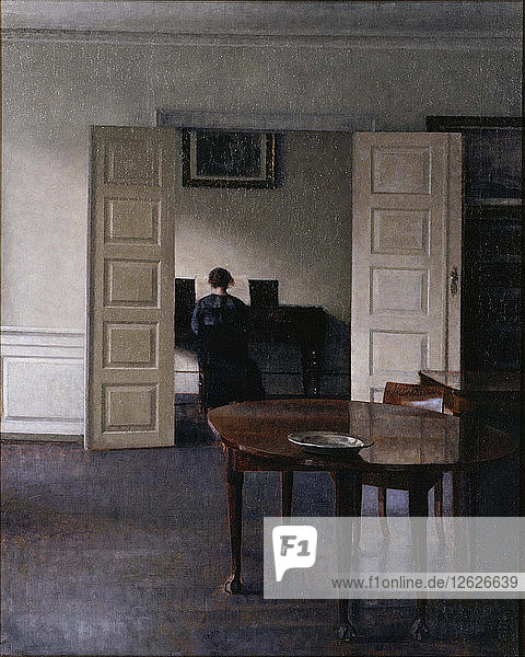 Interieur mit Ida  die Klavier spielt. Künstler: Hammershøi  Vilhelm (1864-1916)