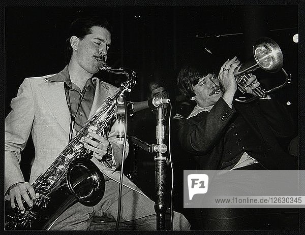 Scott Hamilton and Warren Vache playing live at the Pizza Express  London  1979. Artist: Denis Williams