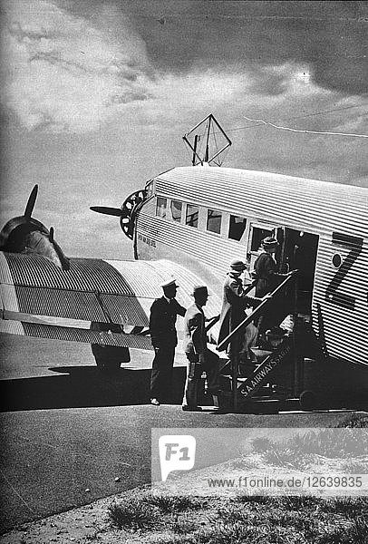 Passengers boarding one of the Junkers airliners of South African Airways  c1936 (c1937). Artist: Unknown.