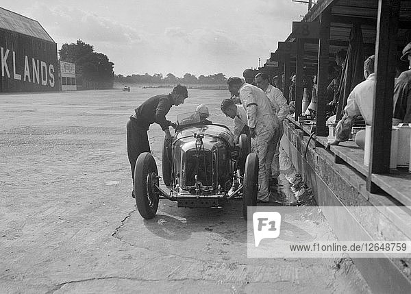 Amilcar C6 of Bill Humphreys in the pits  BRDC 500 Mile Race  Brooklands  1931. Artist: Bill Brunell.