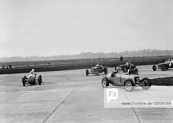 Racing cars taking a corner at Brooklands  Surrey  c1930s. Artist: Bill Brunell.