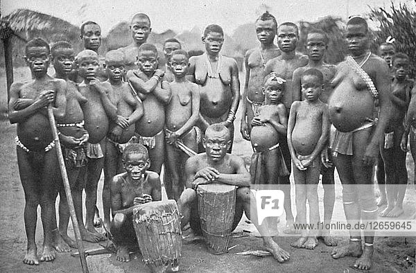 Bambute Pygmy group with two Walese women  1902. Artist: Unknown.