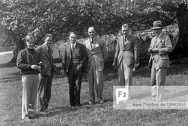 Group of men at Donington Park motor racing circuit Leicestershire c1930s. Artist: Bill Brunell.