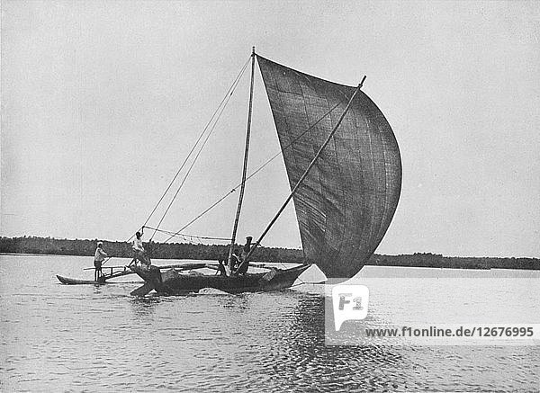Outrigger Canoe in Full Sail on Negombo Lake  c1890  (1910). Artist: Alfred William Amandus Plate.