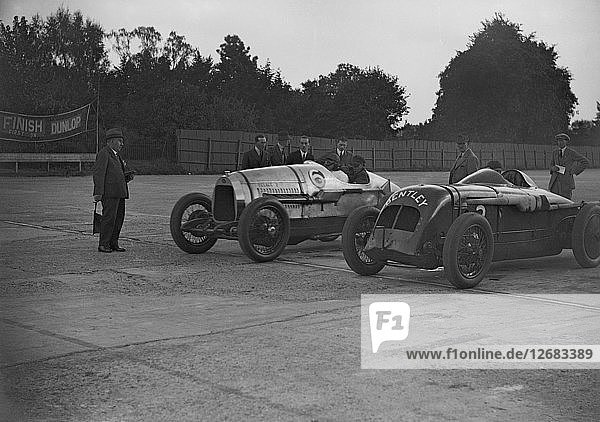 Delage of J Taylor and Bentley of Dudley Froy  Surbiton Motor Club race meeting  Brooklands  1928. Artist: Bill Brunell.