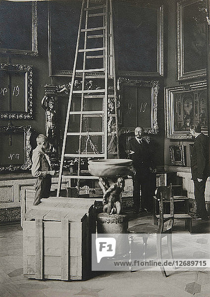 Preparing paintings for evacuation from one of the Italian halls at the Hermitage  1917.
