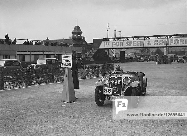 Singer sports competing in the JCC Rally  Brooklands  Surrey  1939. Artist: Bill Brunell.