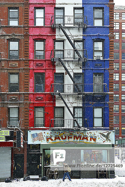 USA  New York  red white blue facade and fire escape  Thompson Street