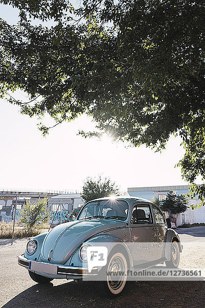 Parked vintage car in sunlight
