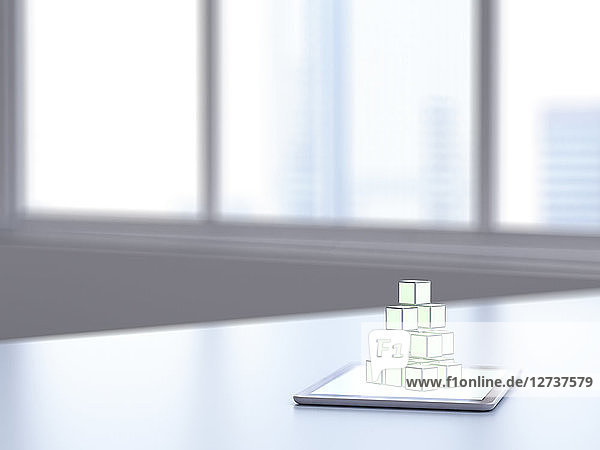 3D rendering  Pile of cubes on digital tablet on desk