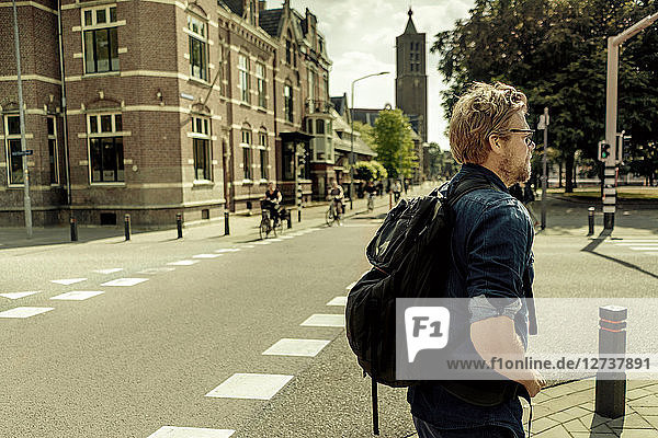 Netherlands  Venlo  businessman standing on a street