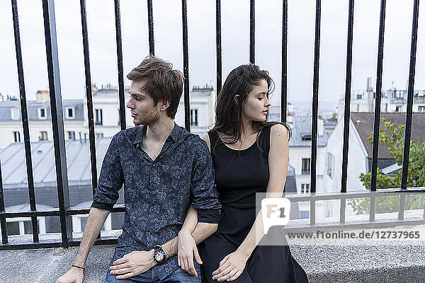 France  Paris  young couple having a break in the district Montmartre