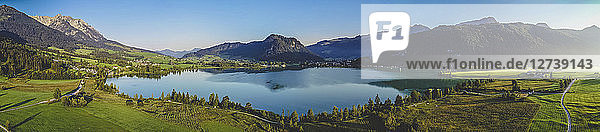 Austria  Tyrol  Kaiserwinkl  Aerial view of lake Walchsee  panorama