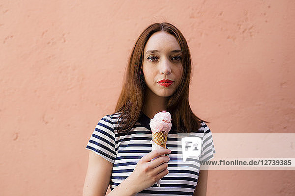 Portrait of young woman with icecream