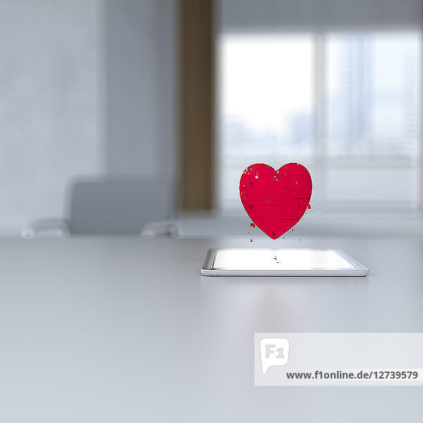 3D rendering  Pixel heart hovering over digital tablet on desk