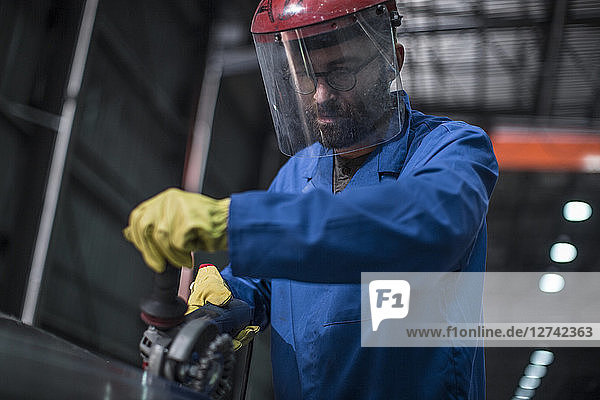 Worker working in steel factory