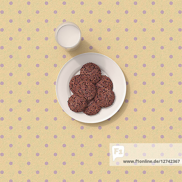 3D rendering  Chocolate cookies on table cloth with polka dots