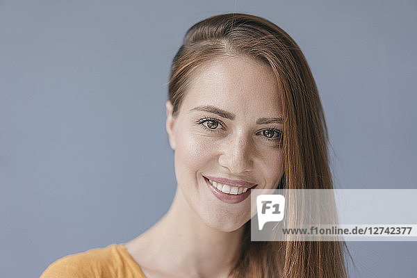Portrait of a pretty woman  smiling  looking at camera