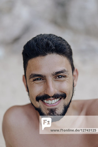Portrait of smiling bearded man