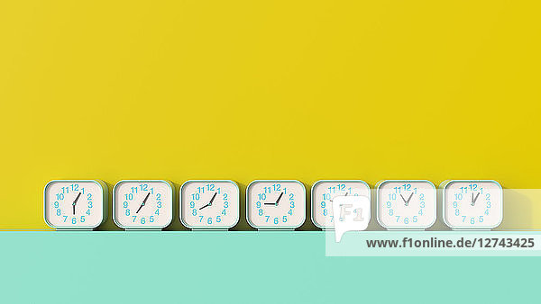 3D rendering  Row of alarm clocks  showing different times