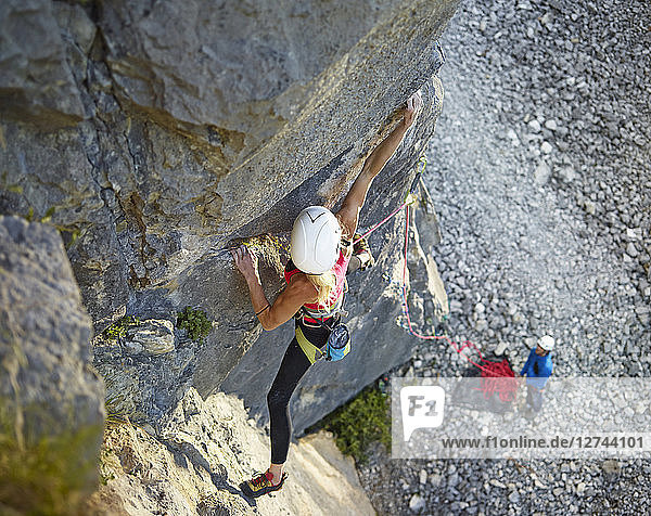 Austria  Innsbruck  Martinswand  woman climbing in rock wall