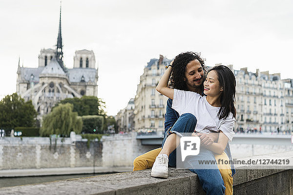 France  Paris  happy young couple at river Seine