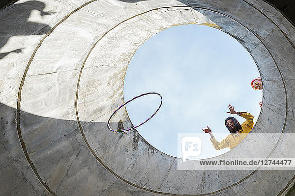 Woman throwing hoop