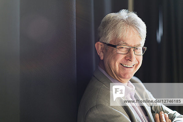 Portrait smiling  confident active senior businessman