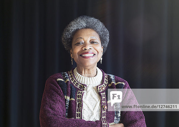 Portrait confident  smiling senior woman