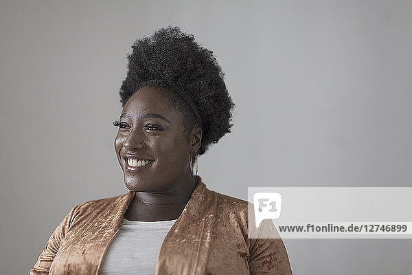 Portrait smiling  confident woman looking away
