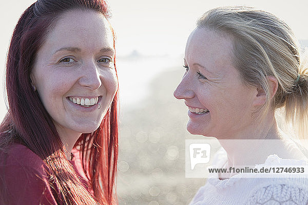 Portrait smiling lesbian couple