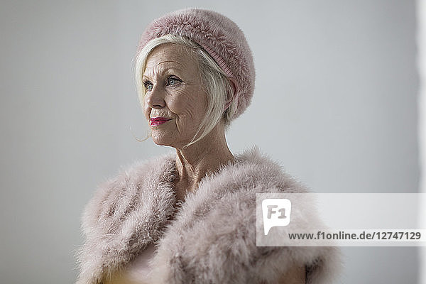Portrait elegant senior woman wearing fur