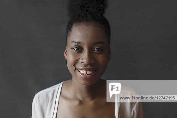 Portrait smiling  confident young woman