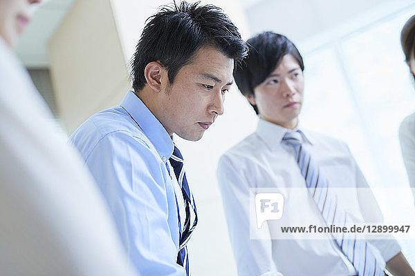 Japanese businesspeople in a meeting