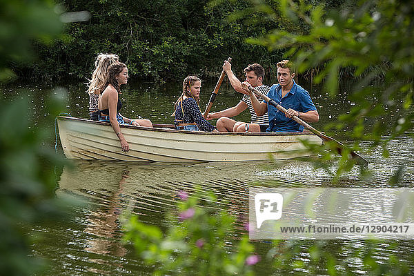 Friends on boat ride in lake