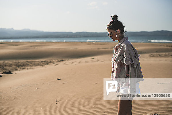 Fashinoable teenage girl on the beach