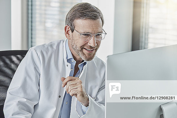 Doctor using computer