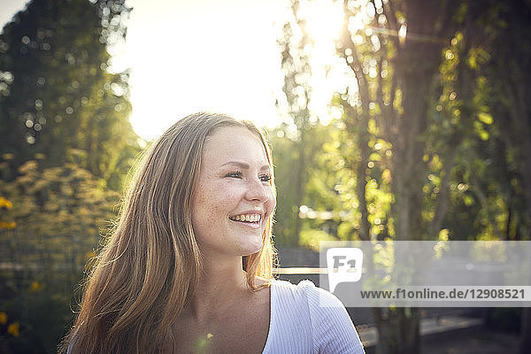 Portrait of a smiling  pretty woman in summer