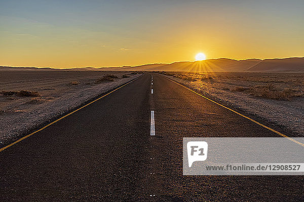 Africa  Namibia  Namib desert  Naukluft National Park  empty road at sunset
