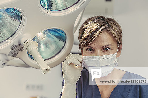 Dental surgeon wearing surgical mask  portrait