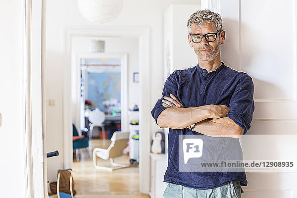 Portrait of mature man at home