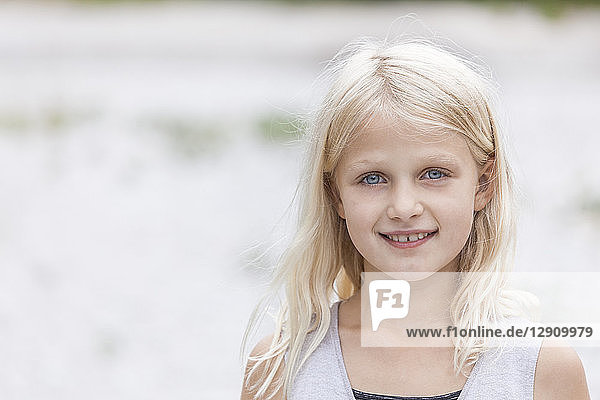 Portrait of smiling girl outdoors