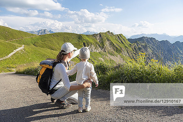 Germany  Bavaria  Oberstdorf  mother and little daughter on a hike in the mountains