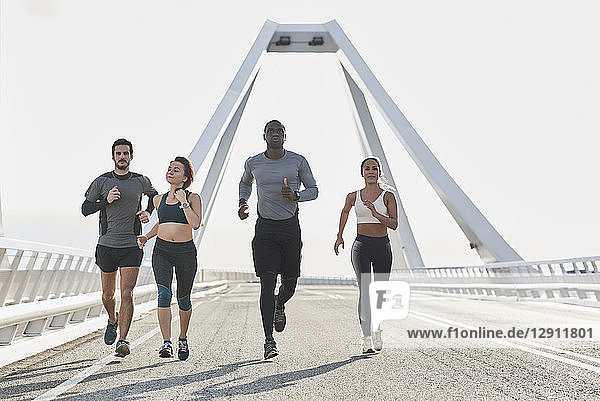 Group of sportspeople jogging